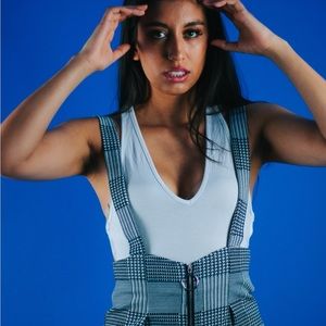 Plaid pants with suspenders attached. Only worn for this photo shoot.